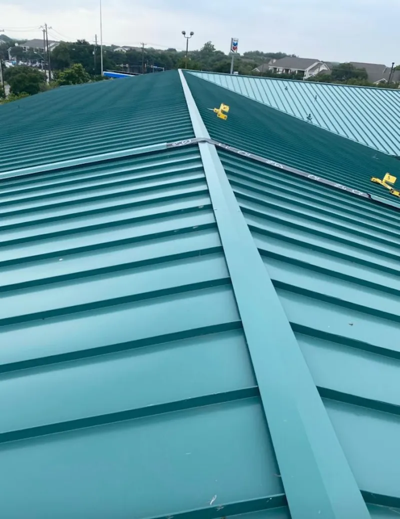Green commercial metal roof ridge and valley for Metal Roof Repair in Newton